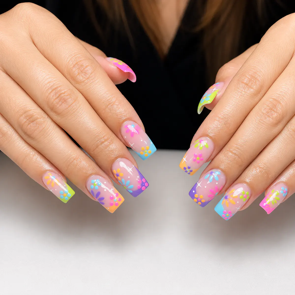 Colourful floral nail art with bright French tips